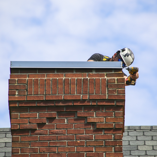 Chimney Chimney Chase Cover installation in Rochester, NY and Spencerport, NY.
