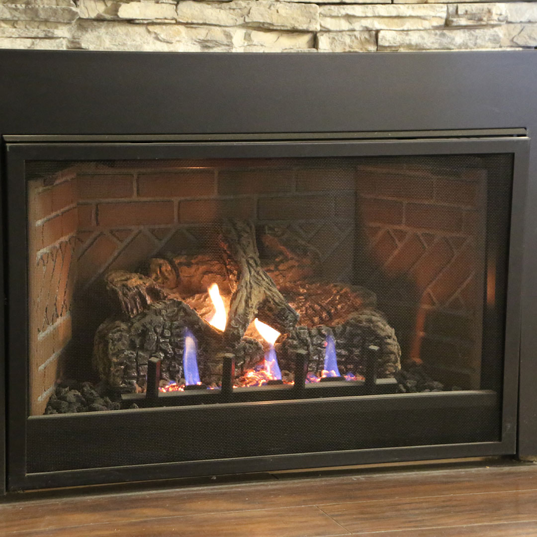 Gas burning fireplace insert in Henrietta NY
