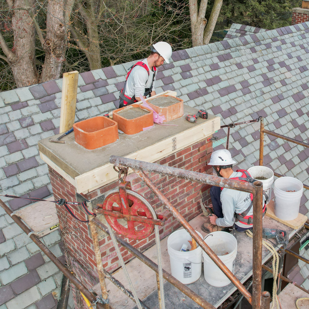 Chimney crown repairs and masonry repairs in Hamburg, NY.
