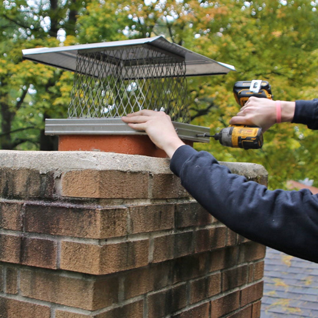 Installing new chimney caps in Webster, NY